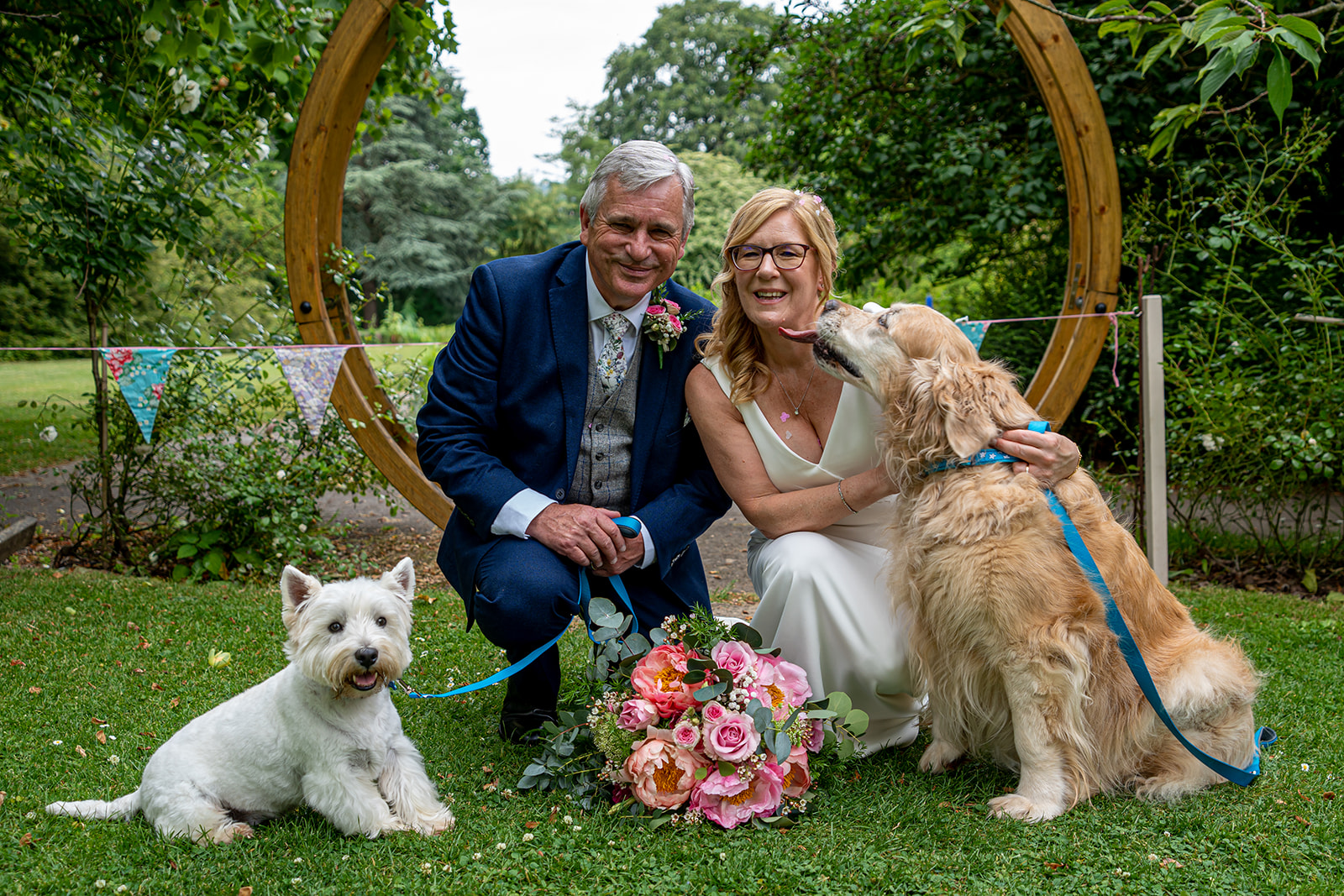 Couple with dogs in front of the moon gate, Sophie TC Photography